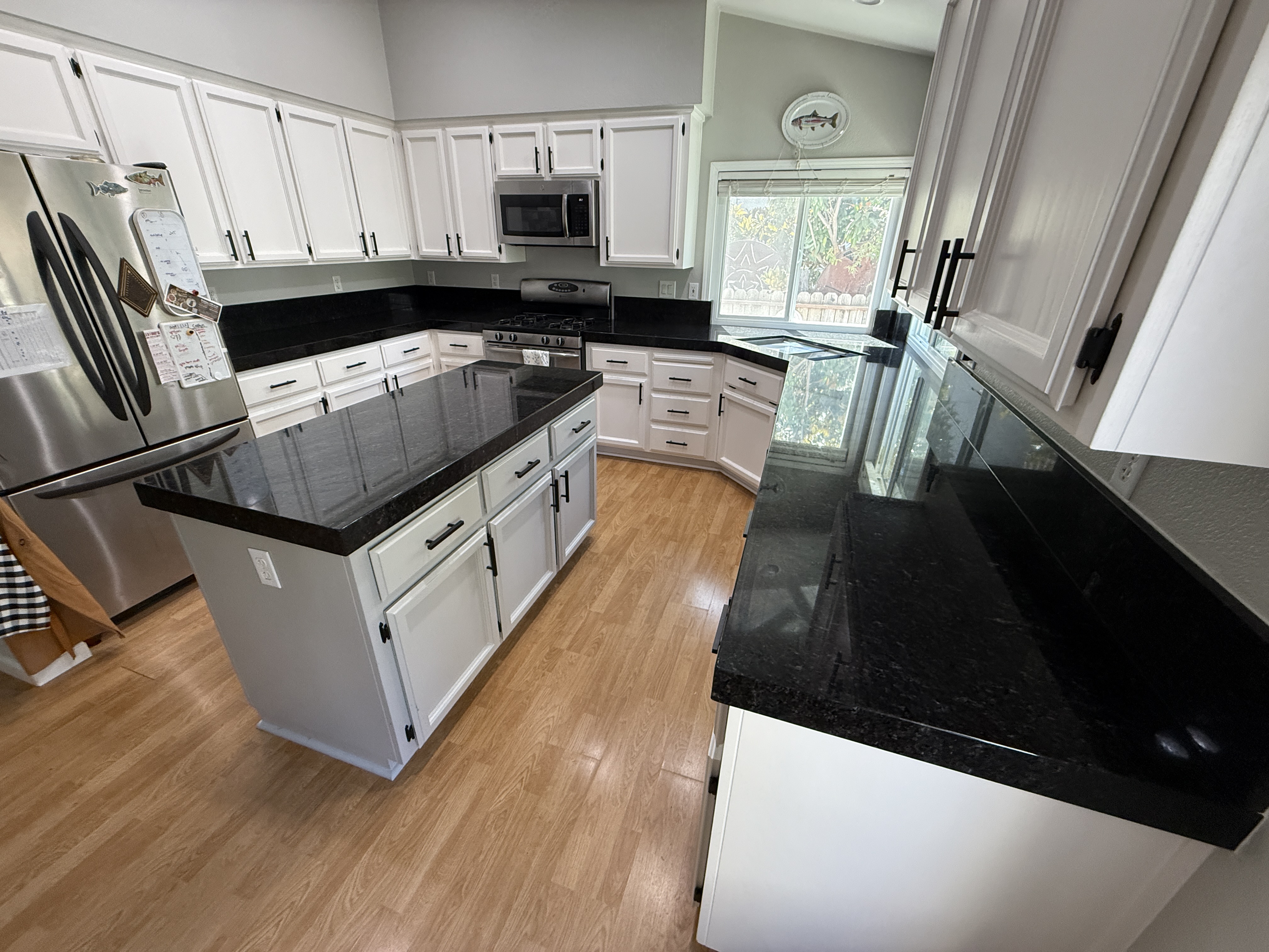 After — Modern Black Stone Kitchen Upgrade